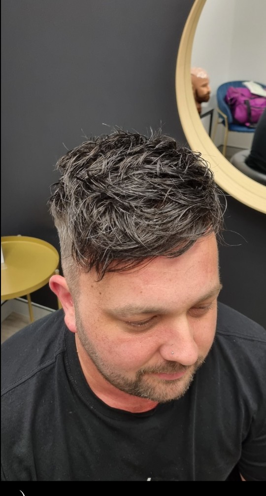 The same client after their Tuffs hair system